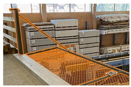 Fanggitter – Materialübergabe mit Kran